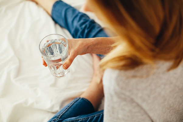 UV treated drinking water in a glass